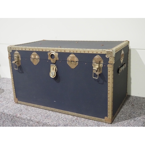 74 - Large blue travel trunk