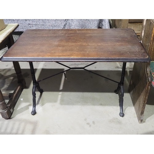 491 - Pub table with cast iron bench H28