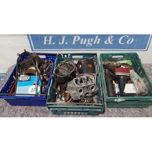 138 - Motorcycle spares to include cylinder heads, hub parts, oil tank etc.