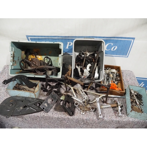 657 - Norton and other spares to include yokes, engine parts, brackets, footrests, stands, etc.