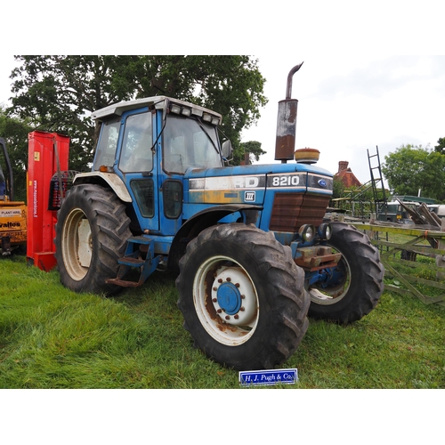 Ford 8210 series 3 4wd tractor, showing 7214 hours, runs and drives. Reg. G356 NKK