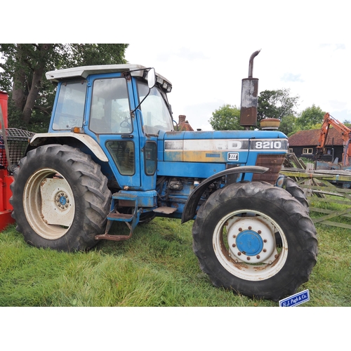 147 - Ford 8210 series 3 4wd tractor, showing 7214 hours, runs and drives. Reg. G356 NKK