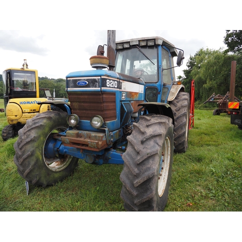 147 - Ford 8210 series 3 4wd tractor, showing 7214 hours, runs and drives. Reg. G356 NKK