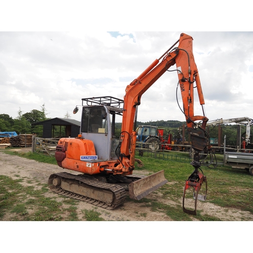 150 - Hitachi EX45.2 tracked excavator, (8 tons) showing 5902 hours, timber grab, rotator and buckets. Run... 