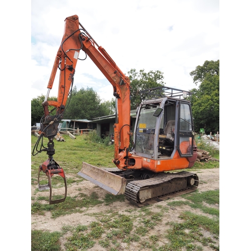 150 - Hitachi EX45.2 tracked excavator, (8 tons) showing 5902 hours, timber grab, rotator and buckets. Run... 