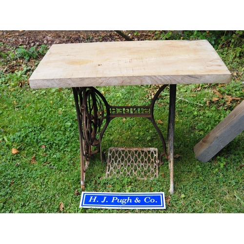 33 - Singer treadle base coffee table with cedar top