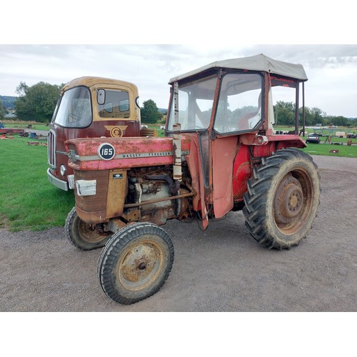 1642 - Massey Ferguson 165 tractor. Runs and drives. Barn stored for 25 years. No docs