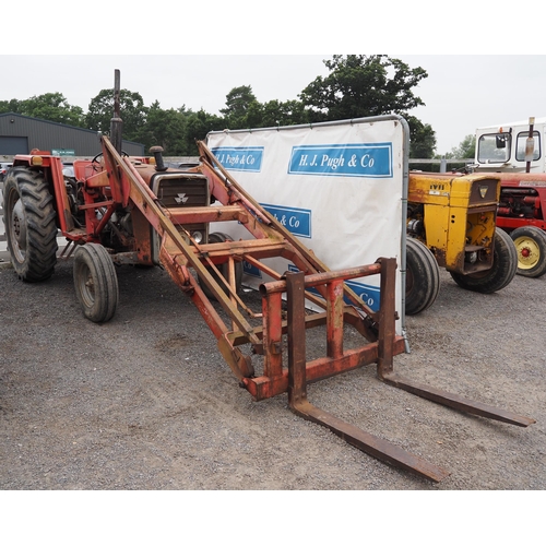 1631 - Massey Ferguson 265 tractor. 1980. Runs and drives. C/w front loader, pallet tines and bucket. Has b... 