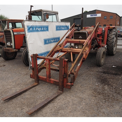 1631 - Massey Ferguson 265 tractor. 1980. Runs and drives. C/w front loader, pallet tines and bucket. Has b... 