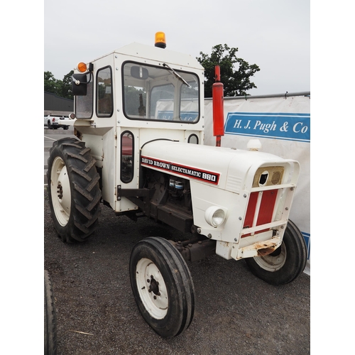 1699 - David Brown 880 tractor with cab. Runs 1967. Reg. MYB 806E. V5 and key in office