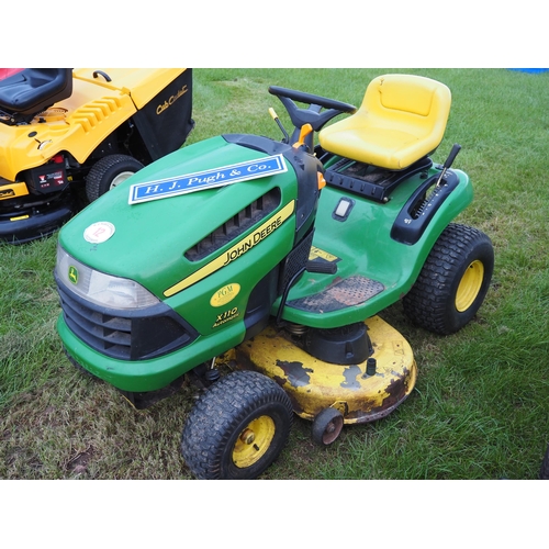 12 - John Deere X110 automatic ride on mower, works well. Key in office