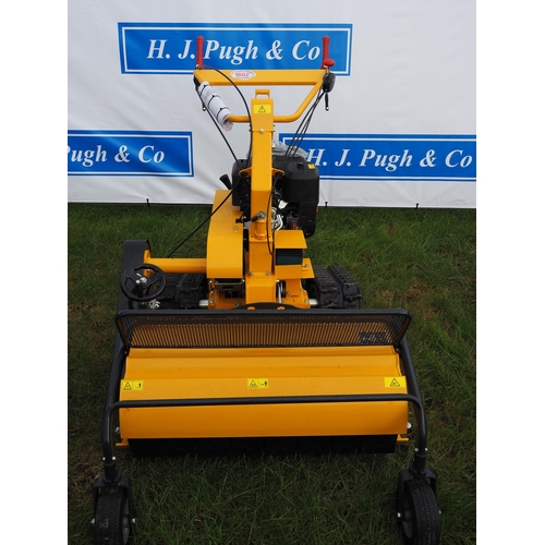 1602 - Track pedestrian 860 flail mower, unused. Key in office