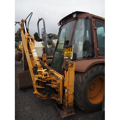 1702 - Case 580K loader with back actor and buckets. Showing 7112 hours. Reg. H344 HDD