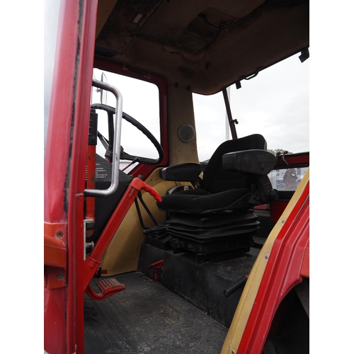 1705 - International 1056 XL 4WD tractor. Runs and drives well, showing 8247 hours, clean original tractor,... 