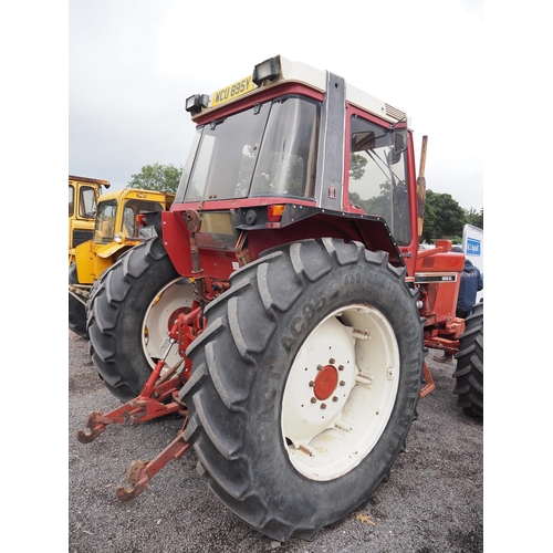 1705 - International 1056 XL 4WD tractor. Runs and drives well, showing 8247 hours, clean original tractor,... 