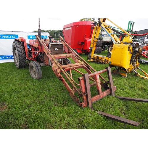 1631 - Massey Ferguson 265 tractor. 1980. Runs and drives. C/w front loader, pallet tines and bucket. Has b... 