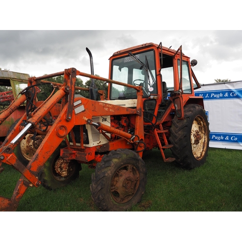 1633 - Belarus 572 4 cylinder tractor, 4 WD with loader and bucket. Runs and drives. Reg. H559 PUY