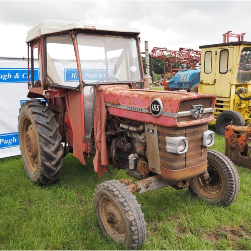 1642 - Massey Ferguson 165 tractor. Runs and drives. Barn stored for 25 years. No docs