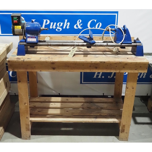 272 - Record DML 24X variable speed woodworking lathe 3ft bed, on wooden bench. Single phase