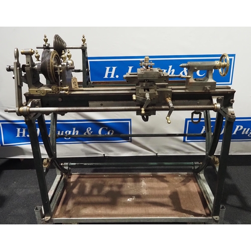 296 - Goyen Ornamental metal working lathe with 4ft bed on cast iron base. Fitted with 5 ornamental brass ... 