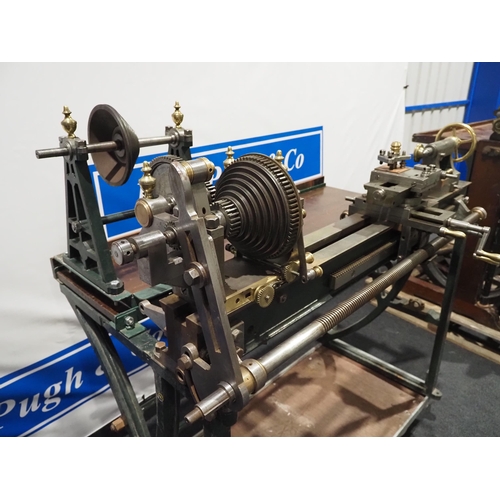 296 - Goyen Ornamental metal working lathe with 4ft bed on cast iron base. Fitted with 5 ornamental brass ... 