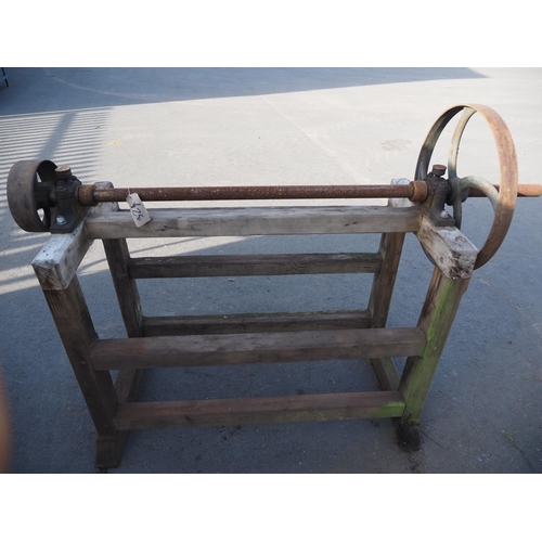 324 - Line shaft with cast iron pulleys on hardwood stand