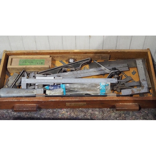 448 - Wooden workshop cabinet and contents of measuring devices, gauges and other tools