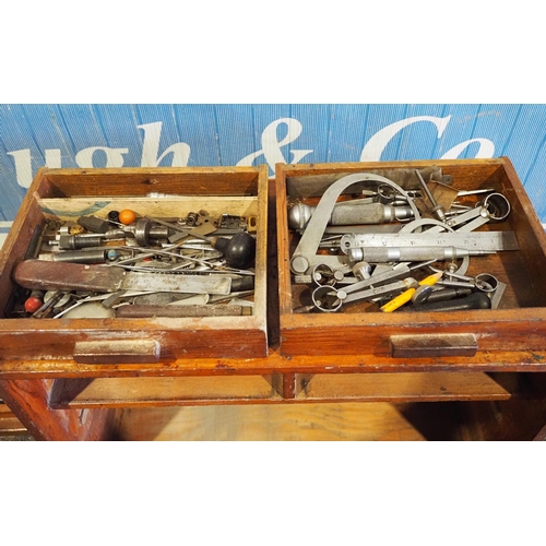 448 - Wooden workshop cabinet and contents of measuring devices, gauges and other tools