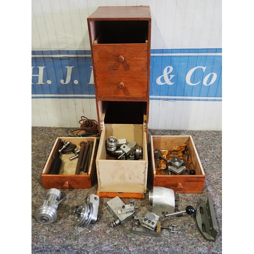 450 - Wooden workshop cabinet and contents of pulleys and other lathe tooling