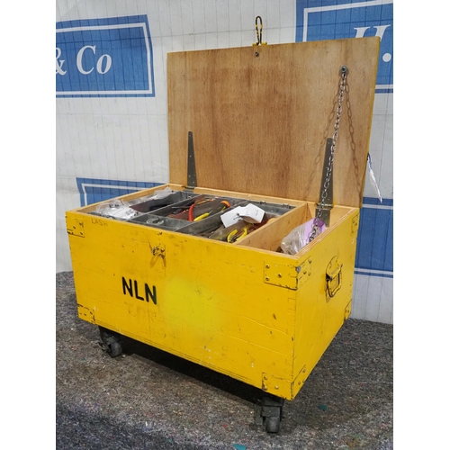 571 - Wooden chest on trolley wheels with contents to include hand tools