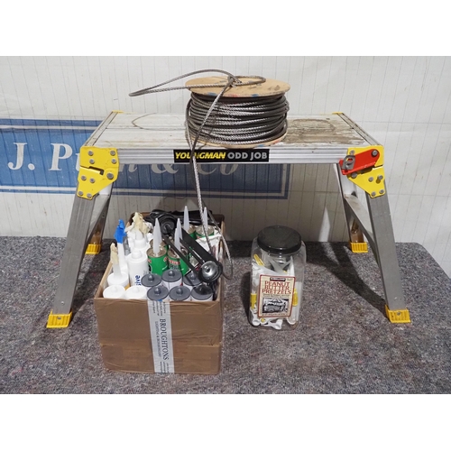 690 - Work platform and assorted tubes of sealant and adhesive