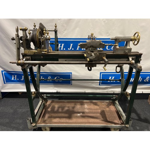 296 - Goyen Ornamental metal working lathe with 4ft bed on cast iron base. Fitted with 5 ornamental brass ... 