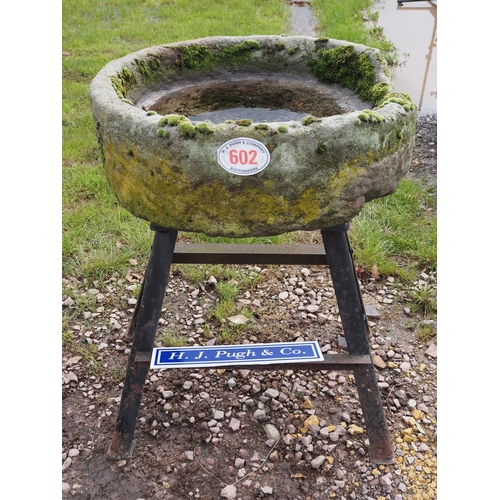 602 - Stone trough on cast iron stand approx. 3ft dia.