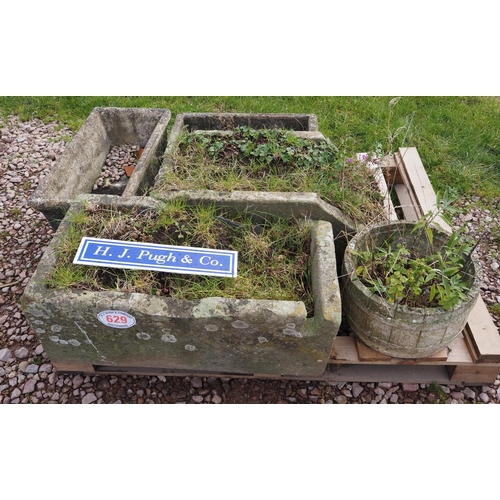 629 - Stone troughs and planters