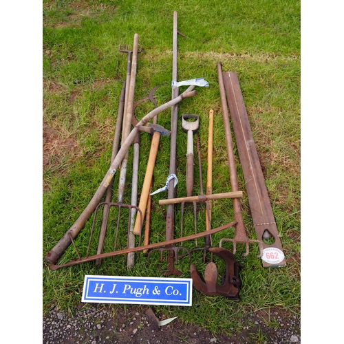 662 - Quantity of garden tools to include scythes, lopper, etc.