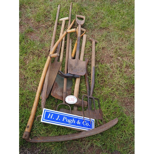 670 - Quantity of garden tools to include scythe, spades, etc.