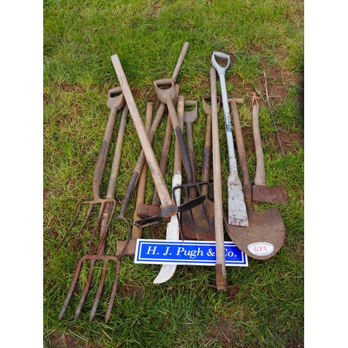 671 - Quantity of garden tools to include forks, spades, etc.