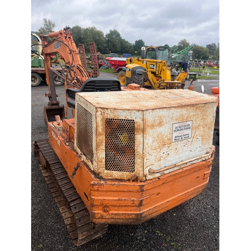 1718E - Kubota KH-14 mini digger. 3 Cylinder diesel. Runs and drives. Showing 7348 hours. Key in office