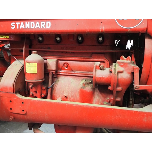 93 - International W-4 Standard tractor. Engine is free. Fitted with good tyres, pto and drawbar