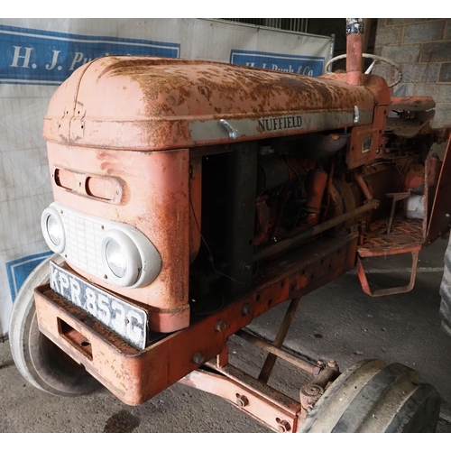 113 - Nuffield 4/65 Tractor. Runs and drives. Fitted with roll frame. S/n 65N/300142-118656. Reg KPR 853G