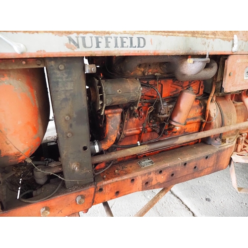 113 - Nuffield 4/65 Tractor. Runs and drives. Fitted with roll frame. S/n 65N/300142-118656. Reg KPR 853G