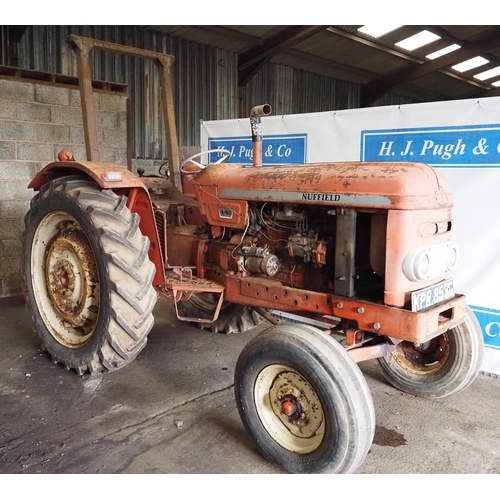 113 - Nuffield 4/65 Tractor. Runs and drives. Fitted with roll frame. S/n 65N/300142-118656. Reg KPR 853G