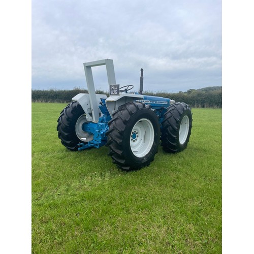 132 - Ford County 754 tractor. 1969. Fully restored. Runs and drives. Fitted with rare torque converter ge... 