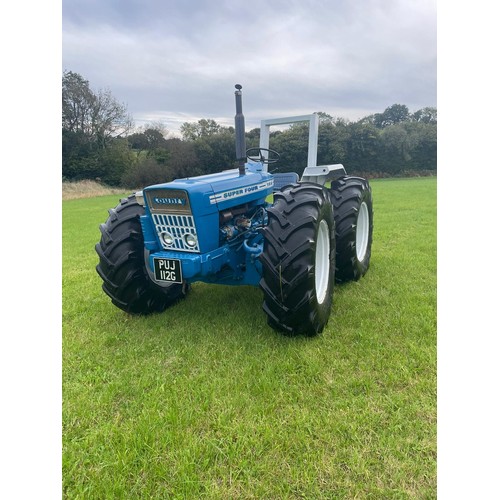 132 - Ford County 754 tractor. 1969. Fully restored. Runs and drives. Fitted with rare torque converter ge... 