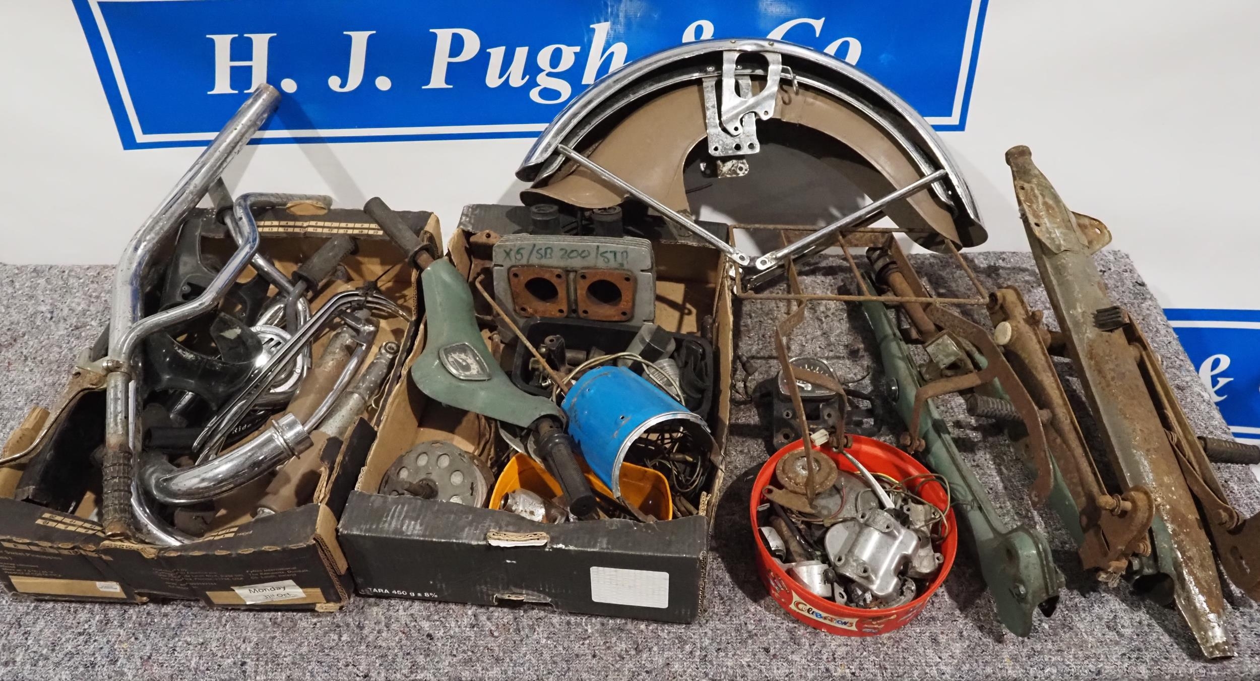 Assorted Japanese motorcycle parts to include Honda Cub