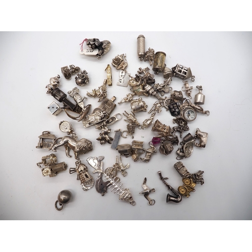 361 - Quantity of charms to include some silver. Total weight approx. 352g