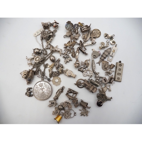 362 - Quantity of charms to include some silver. Total weight approx. 390g