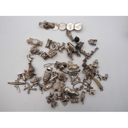 363 - Quantity of charms to include some silver. Total weight approx. 292g