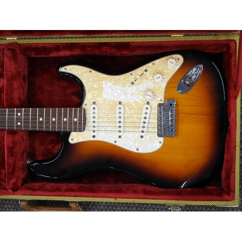 213 - Fender Stratocaster electric guitar serial no. MX13417328 with multi tone switch in hard case