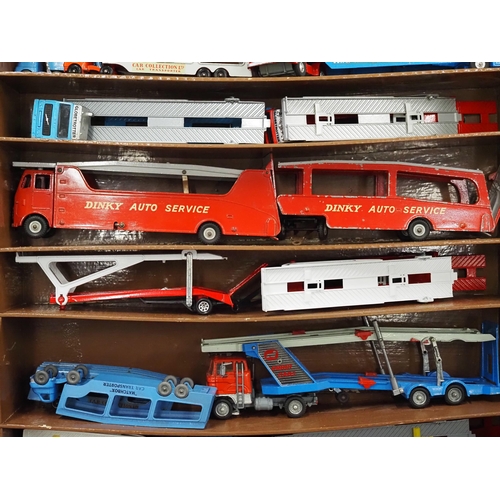 60 - Shelf unit displaying assorted model vehicles to include Dinky and Corgi